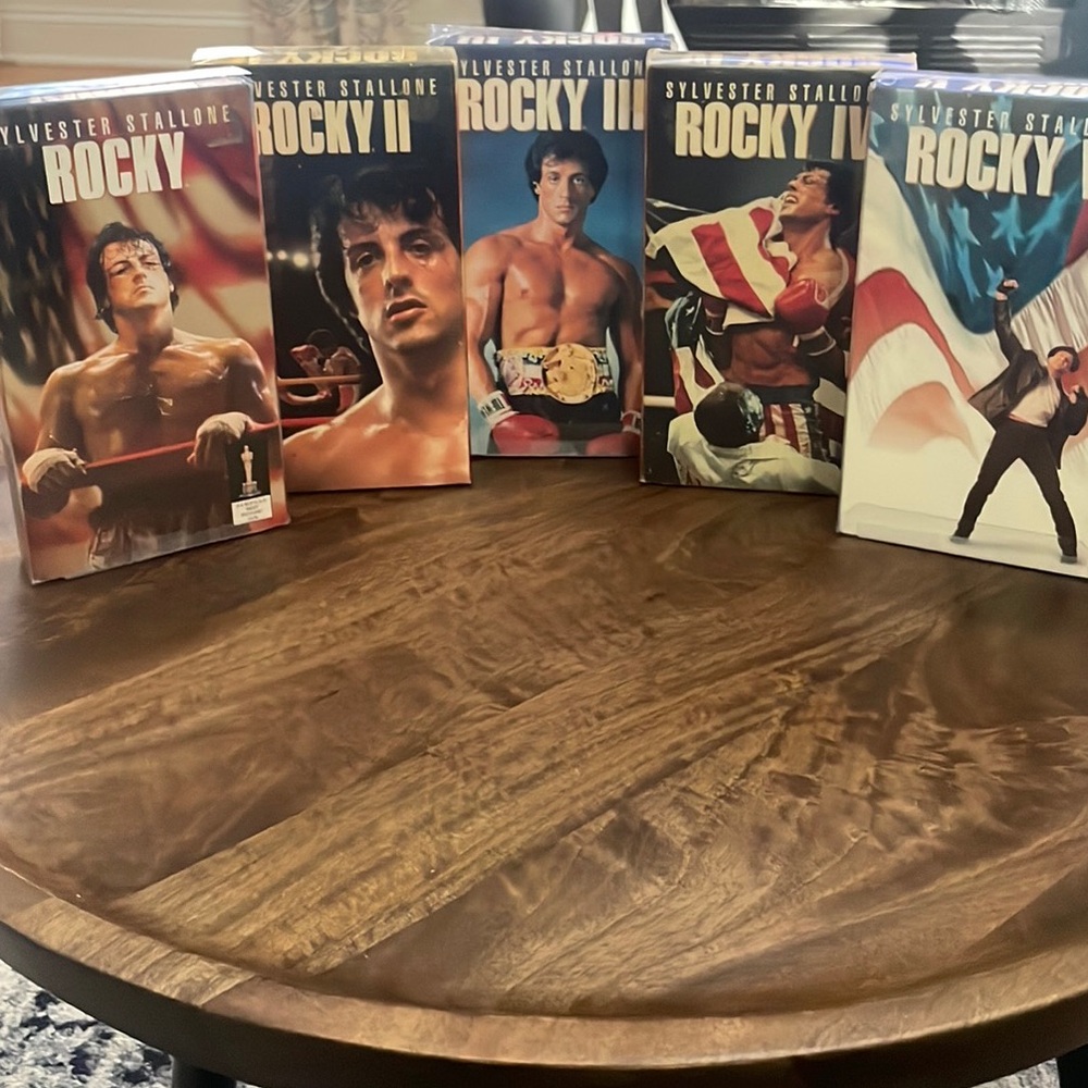 ROCKY VHS Collection I-IV, all in clear plastic sleeves.